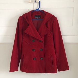 Double-breasted red peacoat